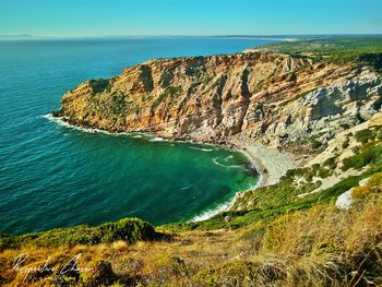 Scenic view of sea against clear sky