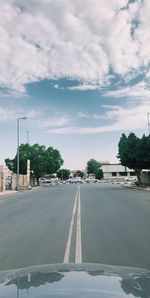 View of road against cloudy sky