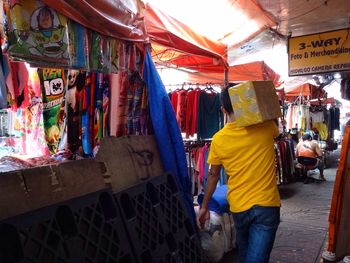 Man standing at market stall