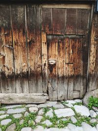 Full frame shot of weathered wooden door