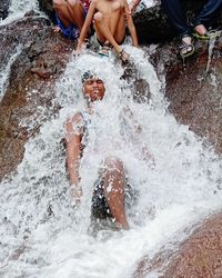 People enjoying in sea