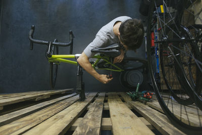 Mechanic working on bicycle