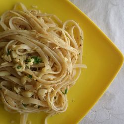 Close-up of noodles in plate on table