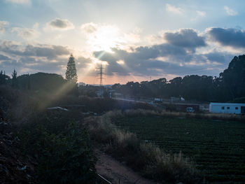 Scenic view of landscape against sky during sunset