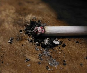 High angle view of cigarette on table