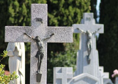 View of cross in cemetery