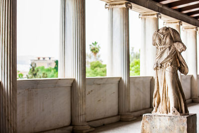 Statue of a young woman probably artemis at the stoa of attalos in athens