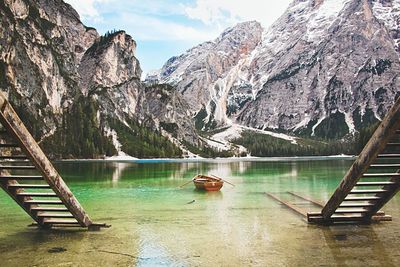 Scenic view of lake with mountain in background