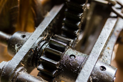 Close-up machinery gears at textile industry