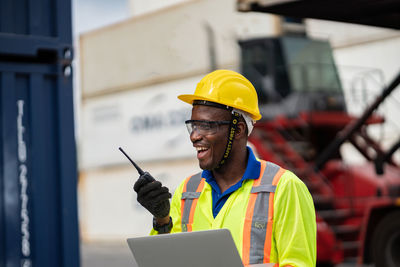 Man working on mobile phone