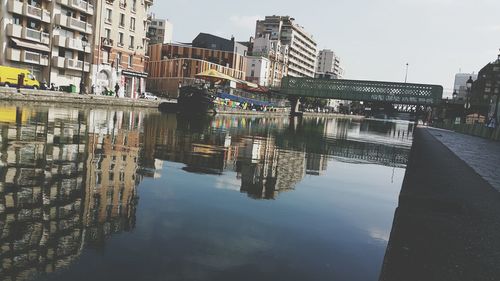 Reflection of buildings in river