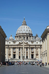 Facade of st peter basilica against blue sky