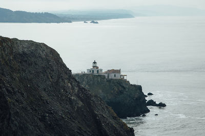 Rocky cliff by sea