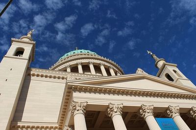 Low angle view of built structure against blue sky