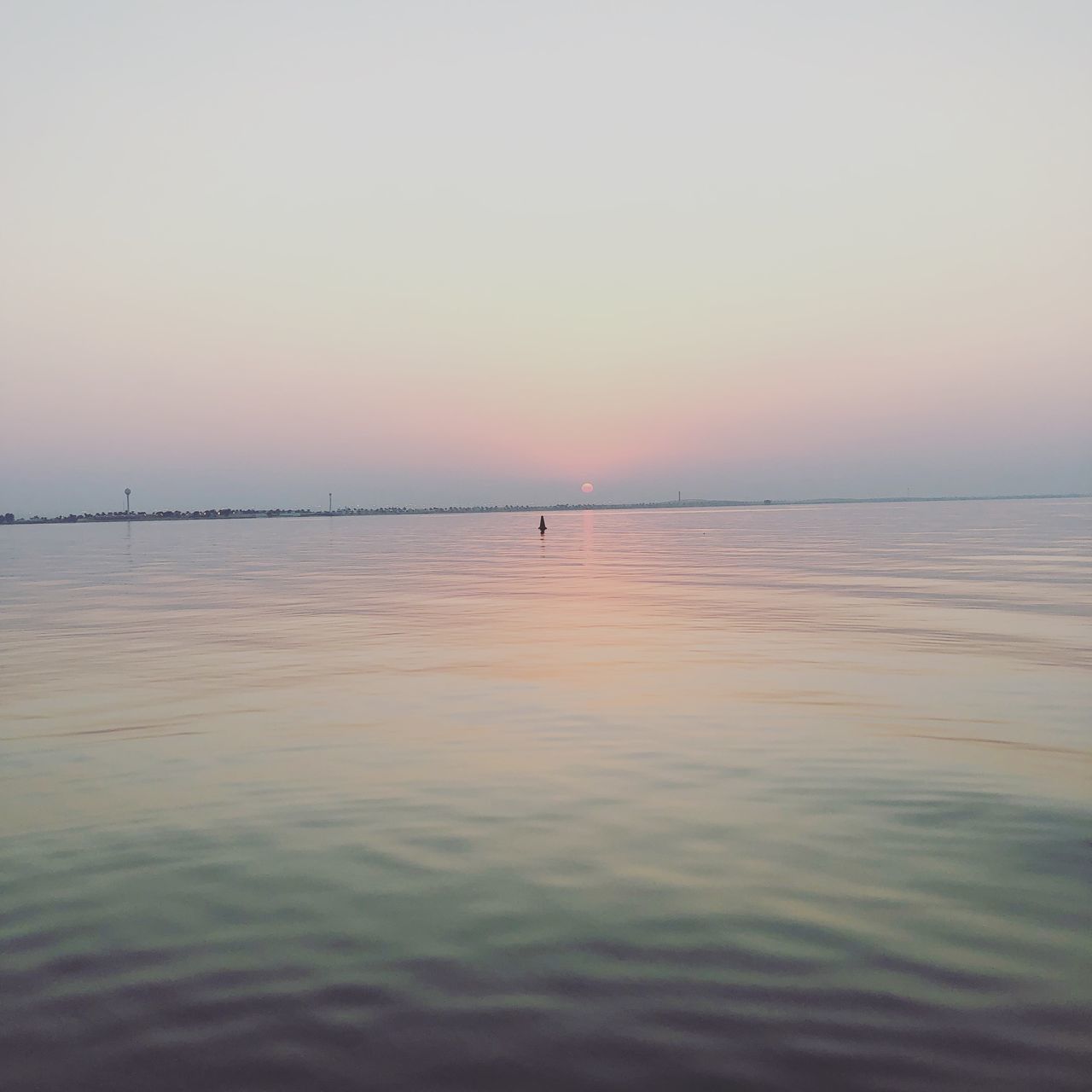 SCENIC VIEW OF SEA AGAINST ORANGE SKY