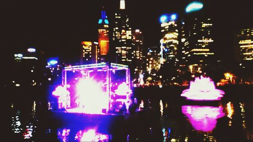 View of illuminated city at night