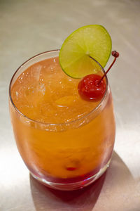 Close-up of cocktail in glass on table