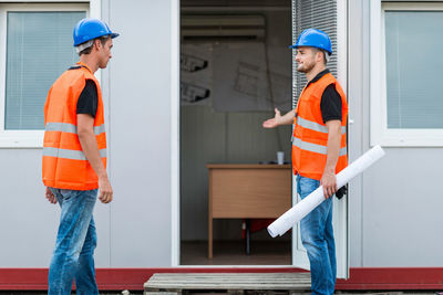 Construction worker talking outdoors