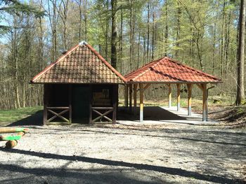 Hut on wooden wall