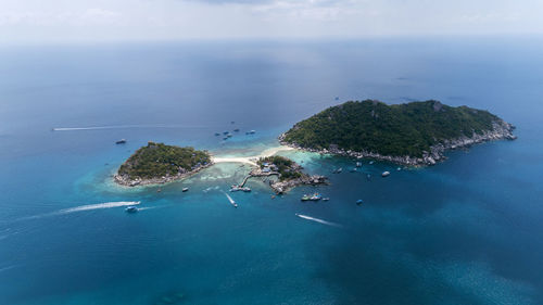 High angle view of sea shore against sky