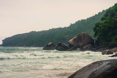 View of a rock in sea