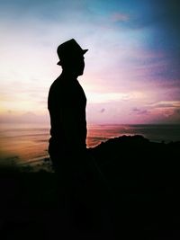 Silhouette of man standing on beach