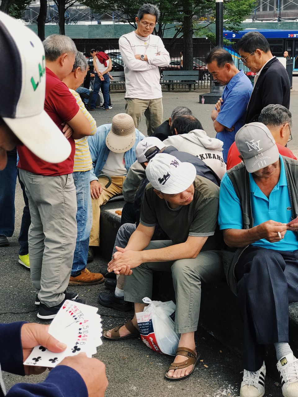 group of people, real people, men, crowd, large group of people, standing, group, looking, adult, women, casual clothing, lifestyles, day, togetherness, full length, authority, clothing, communication, street, waiting, responsibility