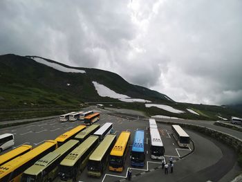 Cars on road against sky