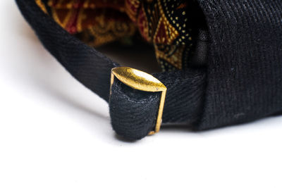 Close-up of black and spoon on table