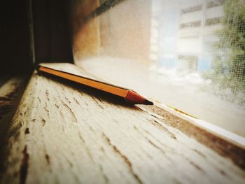 Close-up of cigarette on table