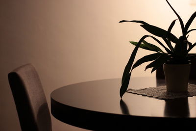 Close-up of vase on table at home