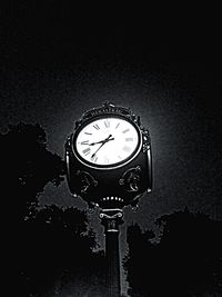 Close-up of illuminated clock