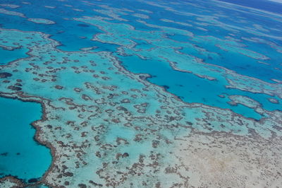 High angle view of blue sea shore