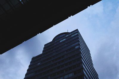 Low angle view of modern buildings against sky