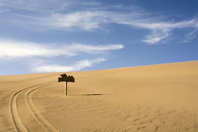 Scenic view of desert against sky