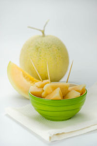 Close-up of fruits against white background