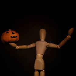 Close-up of pumpkin against black background