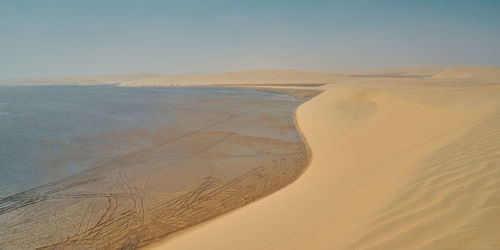 Scenic view of desert against sky