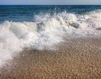 Waves splashing on beach