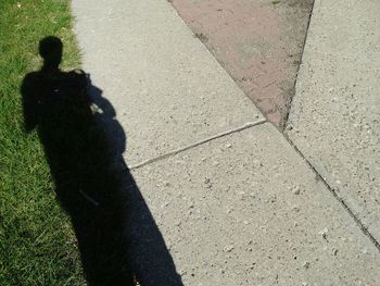 Shadow of woman on ground