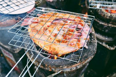 High angle view of pizza on barbecue grill