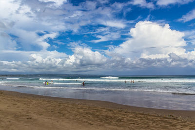 Scenic view of sea against cloudy sky