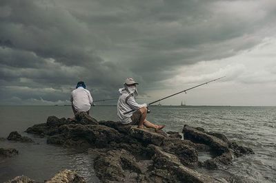 Scenic view of sea against cloudy sky