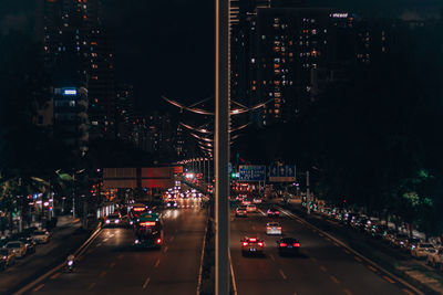 Traffic on city street at night