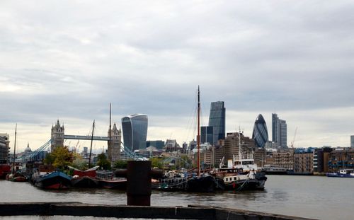 City skyline against cloudy sky