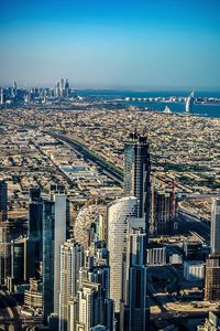 City skyline with sea in background