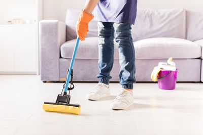 Low section of man cleaning equipment