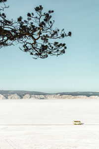 Scenic view of land against clear sky