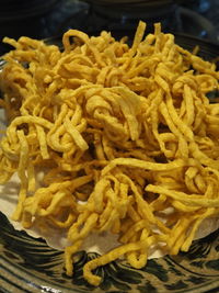 High angle view of pasta in plate on table