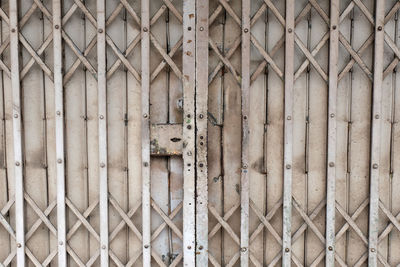 Full frame shot of closed metal gate